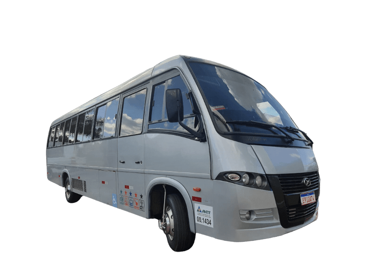 Micro-ônibus branco em vista lateral